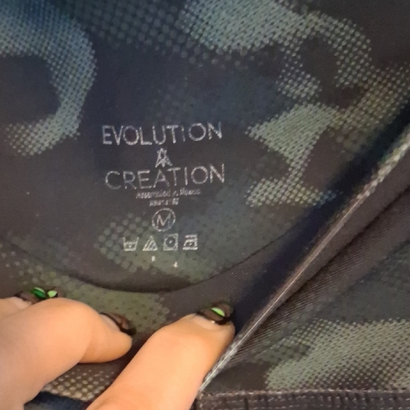 Size Medium Evolution and Creation Green and Black Leggings - Picture 2 of 3